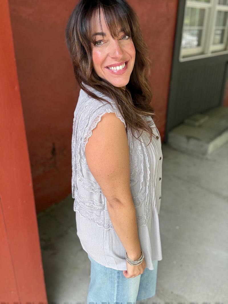 "In Flight" Sleeveless Blouse